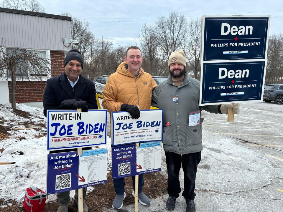 George Varghese, Drew Russo, write-in President Joe Biden supporters, and Chris Liquori, a Dean Phillips supporter, make the case for their candidates in the New Hampshire primary at New Franklin School in Portsmouth Tuesday, Jan. 23, 2024.