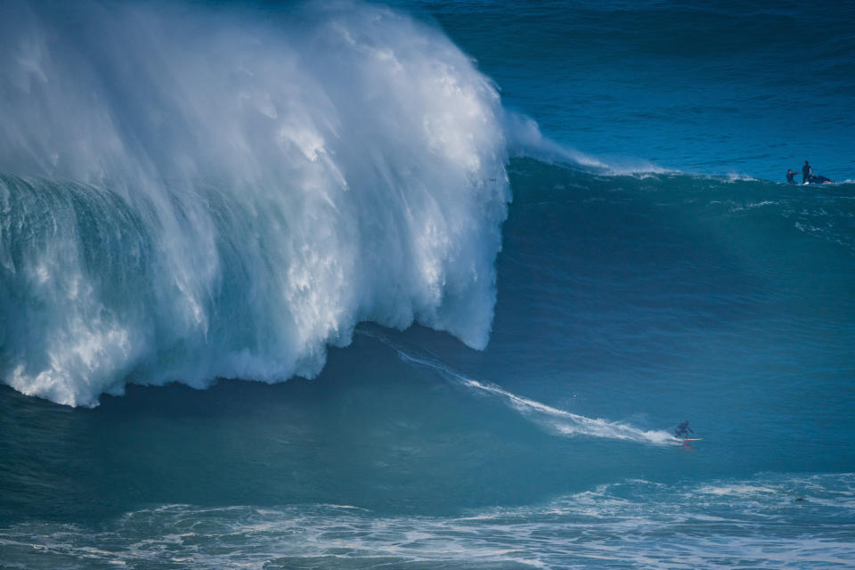 NAZARE, PORTUGAL - 2020/10/29: Big wave surfer Othmane Choufani from Marocco rides a wave during a tow surfing session at Praia do Norte on the first big swell of winter season. (Photo by Henrique Casinhas/SOPA Images/LightRocket via Getty Images)