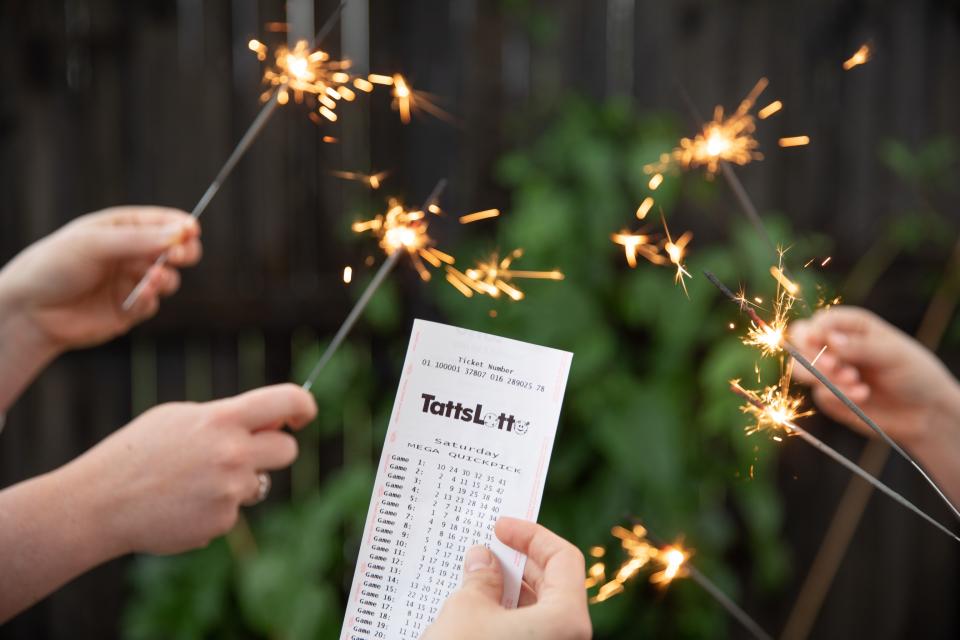 Tatts Lotto ticket with sparklers