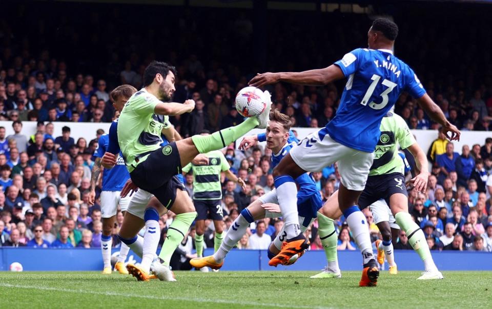 Manchester City's Ilkay Gundogan scores their first goal - REUTERS/Carl Recine