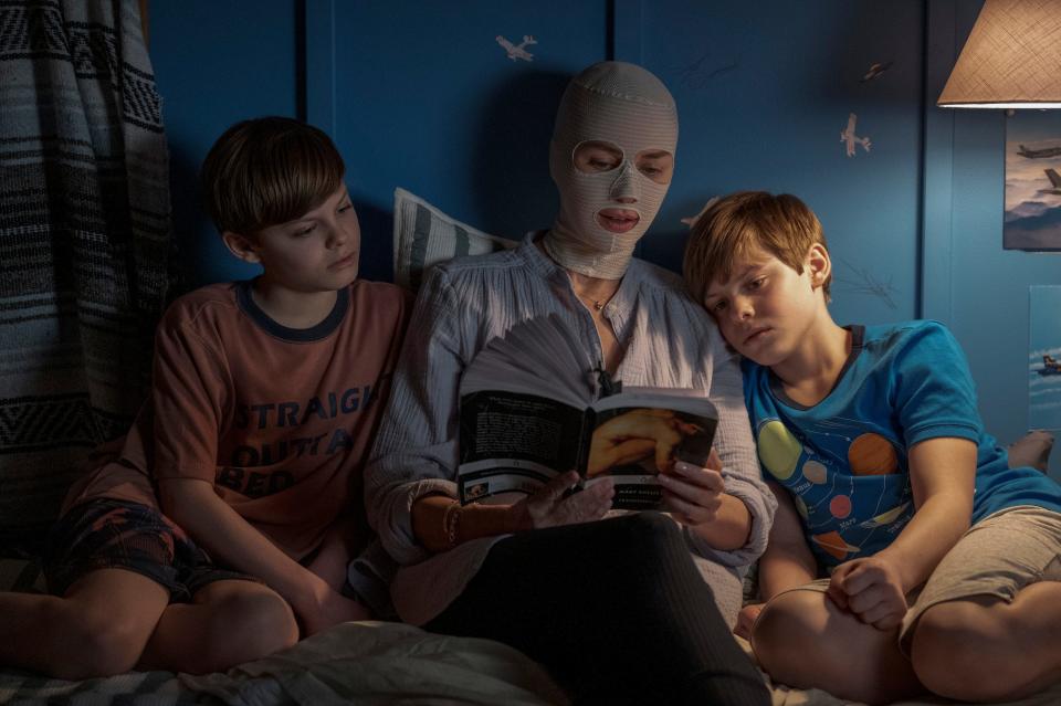 Naomi Watts stars as a mom fresh out of surgery who earns side-eye from her twin sons (Nicholas and Cameron Crovetti) in the horror remake "Goodnight Mommy."