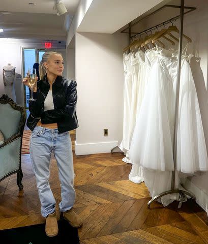 <p>Alex Cooper/ Instagram</p> Alex Cooper shares a wedding dress shopping photo