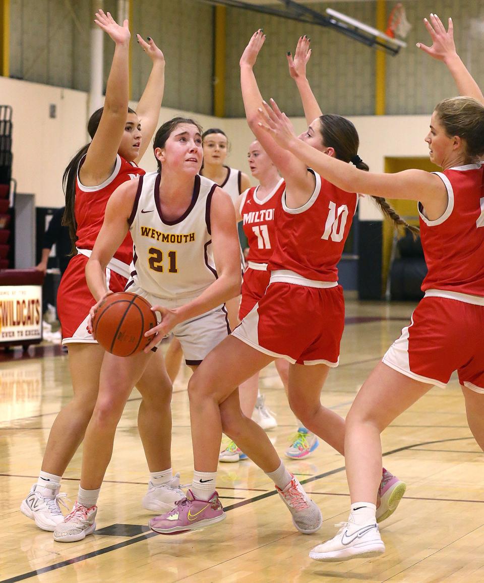 Milton triple teams Weymouth forward Megan Doyle under the net.

Battle of the Wildcat. The Weymouth Wildcats hosted the Milton Wildcats girls basketball on Friday Jan. 5, 2024