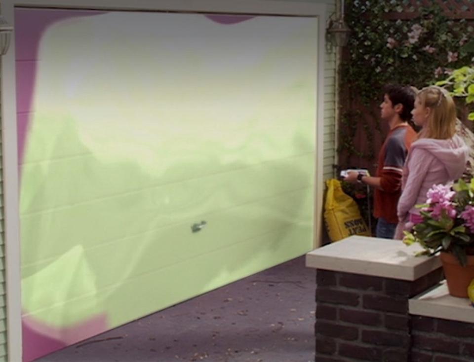 Ricky Ullman and Aly Michalka change the color of a garage door from purple to green