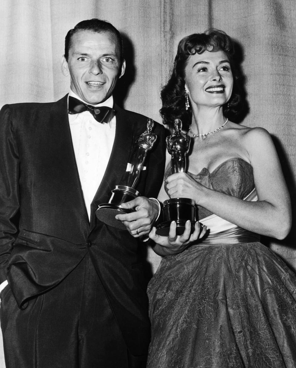 Frank Sinatra and Donna Reed hold their Oscars for "From Here To Eternity."