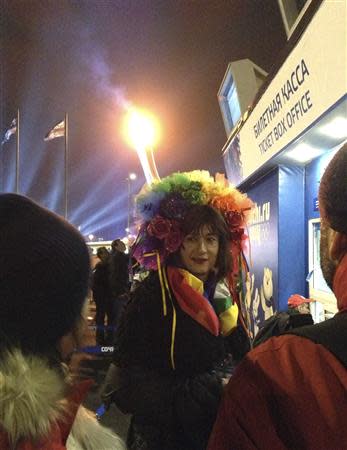 Transgender Vladimir Luxuria obtains a ticket before she was detained for the second time as she attempted to enter a women's ice hockey match in Shayba Arena at the 2014 Sochi Winter Olympics, February 17, 2014. REUTERS/Catherine Koppel