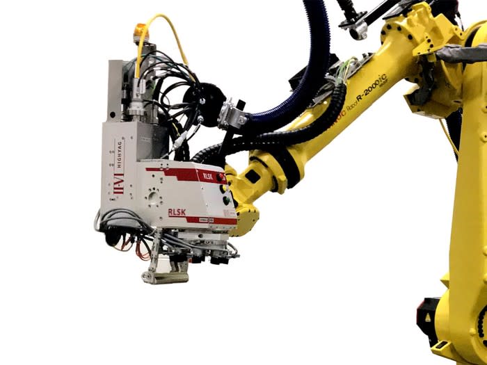 A robotic arm with a laser at the end, with the II-VI logo on it