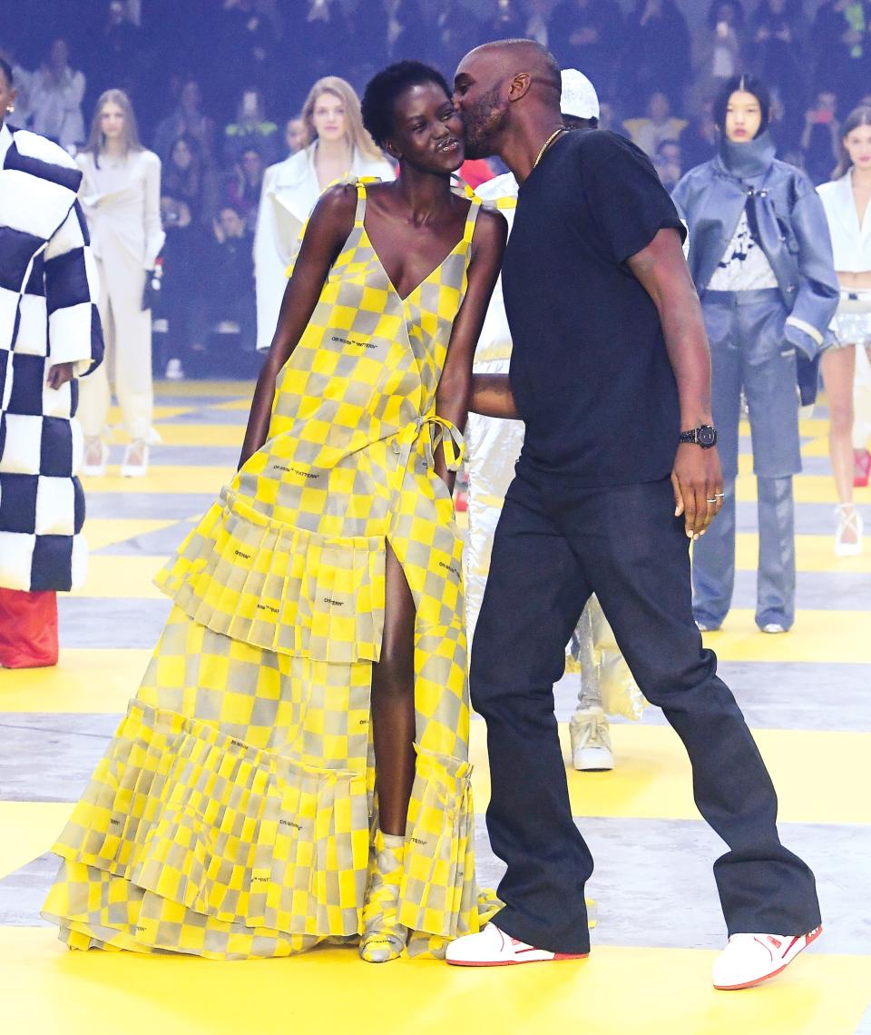 Adut Akech and Virgil Abloh on the runway at the Off-White fall 2019 show, Paris.  From Black in Fashion, published by Union Square & Co. in 2024.  Photo by Giovanni Giannoni, courtesy WWD/Fairchild Media.