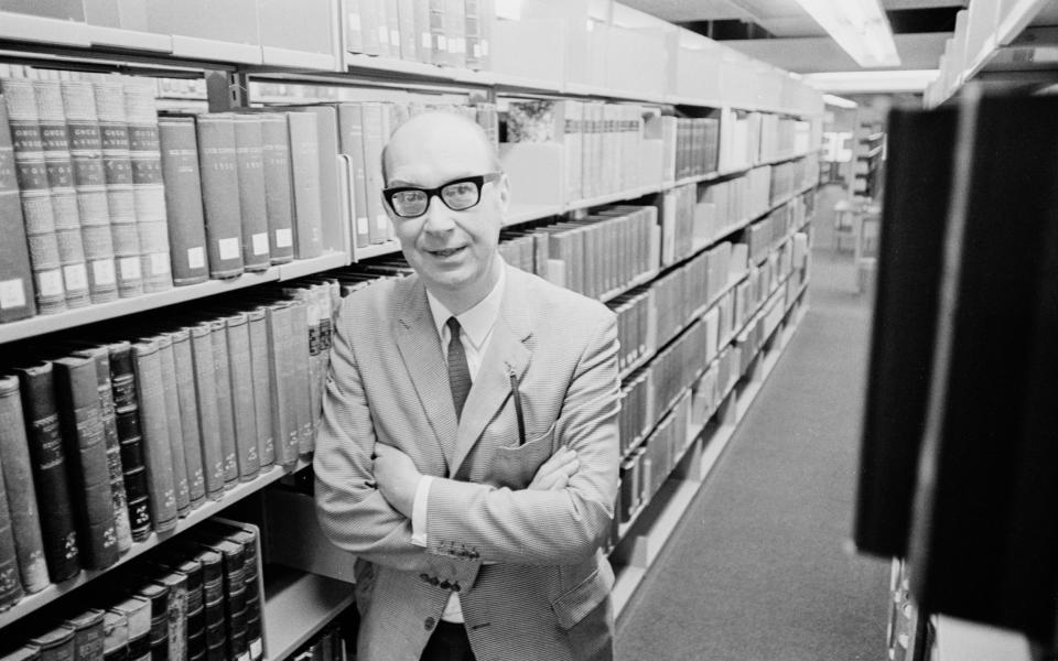 Poet Philip Larkin talking about his new anthology 'The Oxford Book of 20th Century English Verse' prior to its inclusion on the BBC television series 'Poetry Prom', in Hull University Library, Yorkshire, July 1973 - Radio Times/Getty 