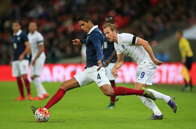 Varane (left) helped France win the 2018 Word Cup (Nick Potts/PA).