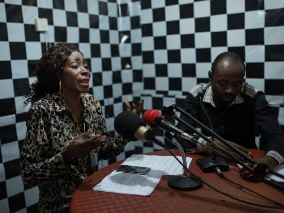 Noelle leads the conversation on RTR radio in Beni. The station has a million listeners in Northern Kivu, an Ebola hotspot (IFRC/Maria Santto)