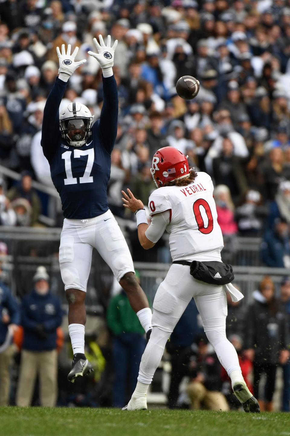 Penn State defensive end Arnold Ebiketie (17) pressures Rutgers quarterback Noah Vedral (0) during an NCAA college football game in State College, Pa., Saturday, Nov. 20, 2021. Penn State won 28-0. (AP Photo/Barry Reeger)