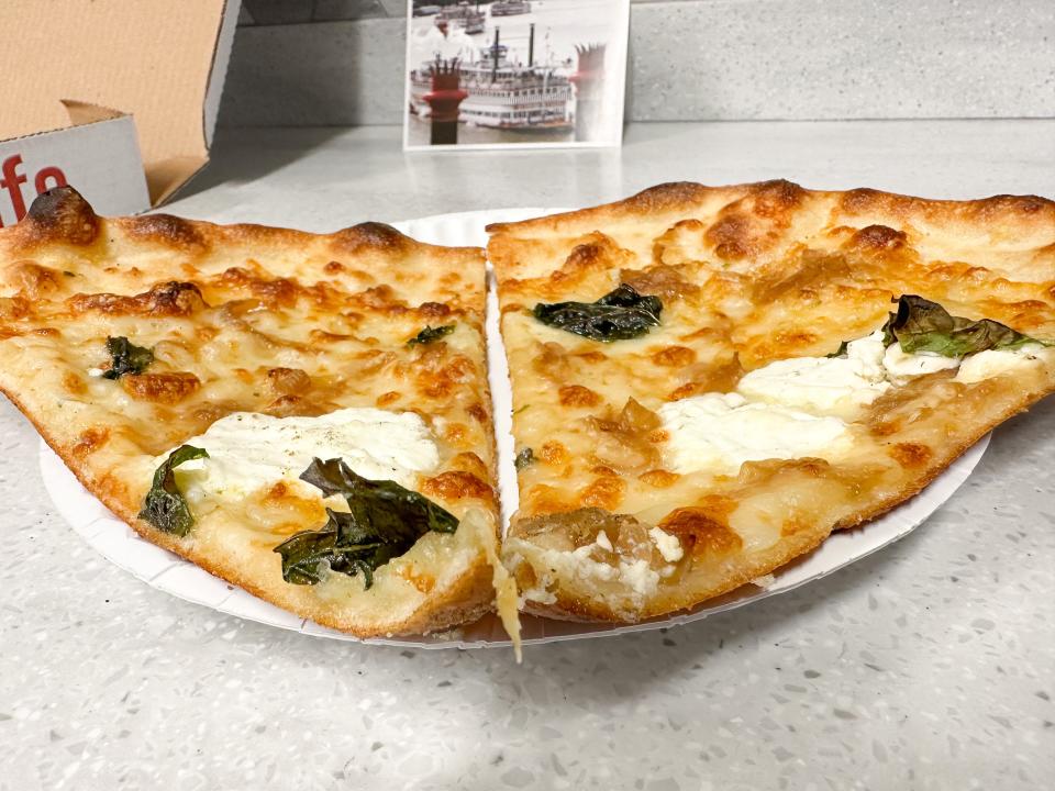 Trophy Pizza's White Pizza, which features caramelized onions, basil and ricotta cheese.