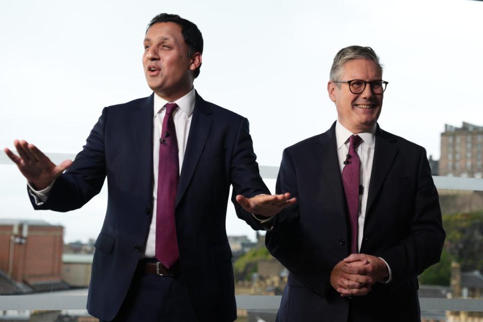 Prime minister Keir Starmer (right) and Scottish Labour leader Anas Sarwar during an event in Edinburgh to welcome new Labour MPs in Scotland following Labour’s victory in the 2024 general election (PA)