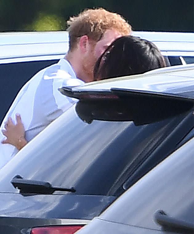 The couple shared a cute kiss, with Harry still in his polo gear from the game. Photo: Mega Australia