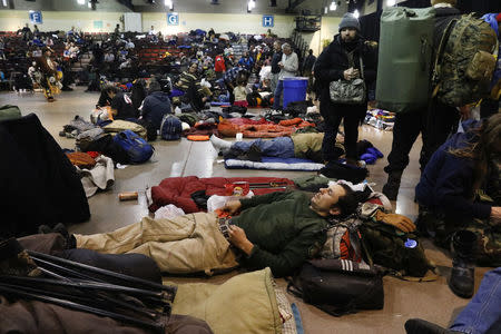 Activists and veterans take shelter at the Prairie Knights Casino due to a blizzard on the Standing Rock Indian Reservation, near Fort Yates, North Dakota, U.S., December 6, 2016. REUTERS/Lucas Jackson