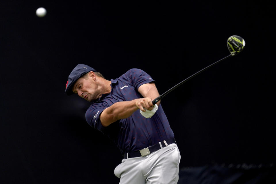 Bryson DeChambeau plays his shot from the seventh tee during the third round of the U.S. Open Golf Championship, Saturday, June 19, 2021, at Torrey Pines Golf Course in San Diego. (AP Photo/Gregory Bull)