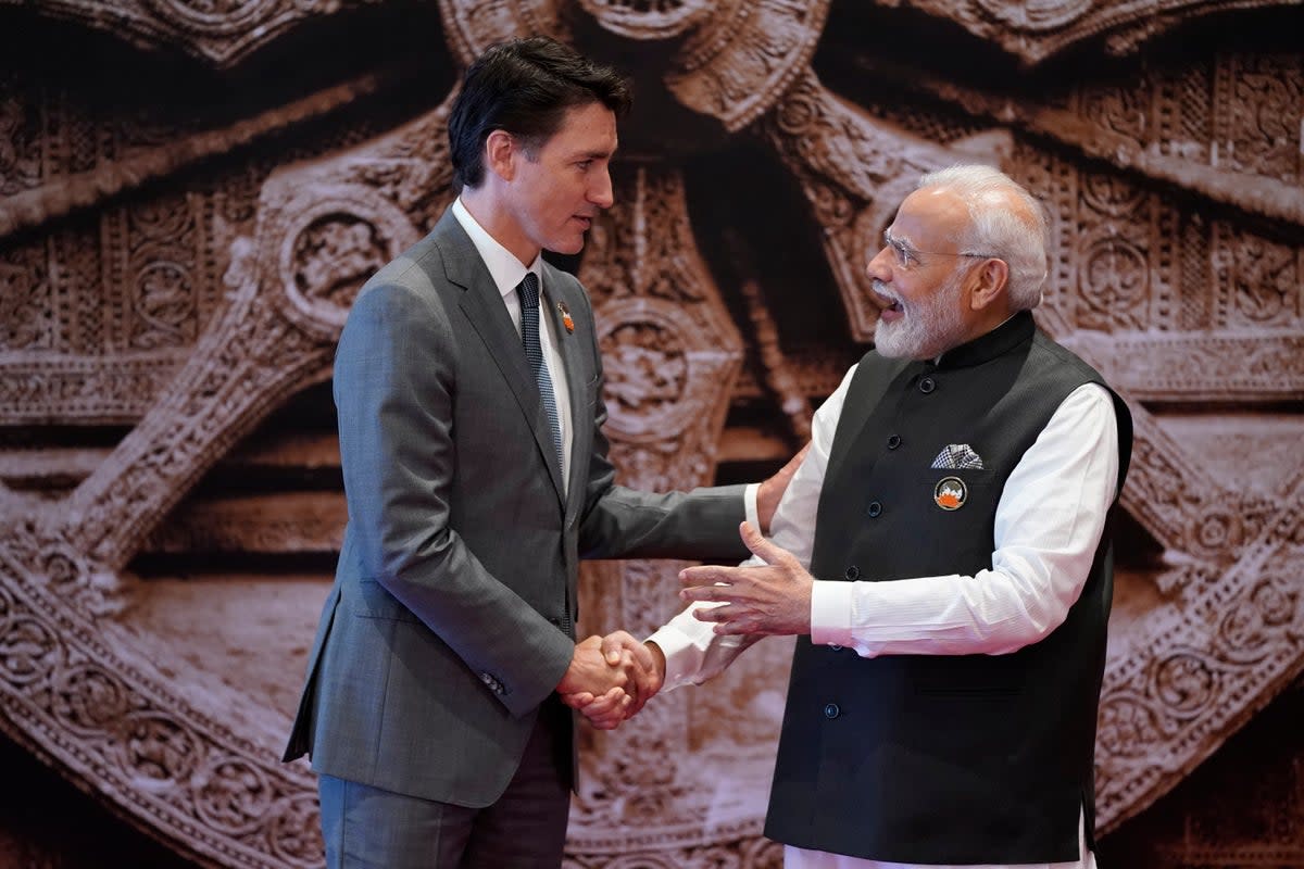 Indian prime minister Narendra Modi with Canadian prime minister Justin Trudeau in New Delhi, India (AP)