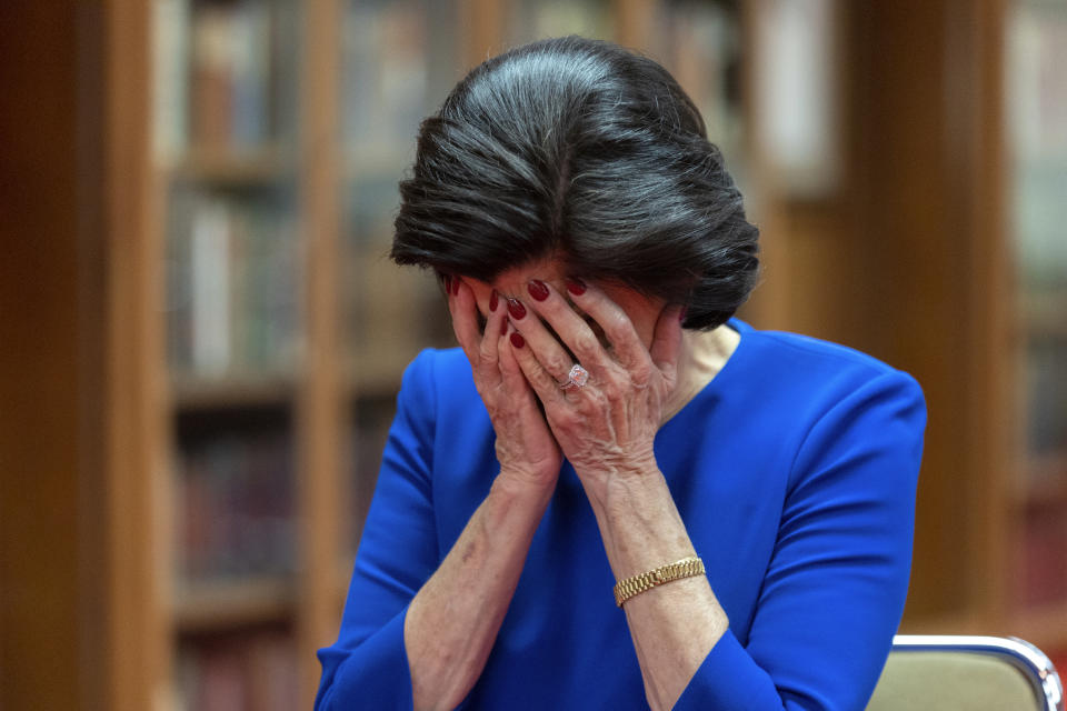 Luci Baines Johnson imitates her father President Lyndon B. Johnson as she shares stories of him at the LBJ Presidential Library, May 16, 2023, in Austin, Texas. (AP Photo/Stephen Spillman)