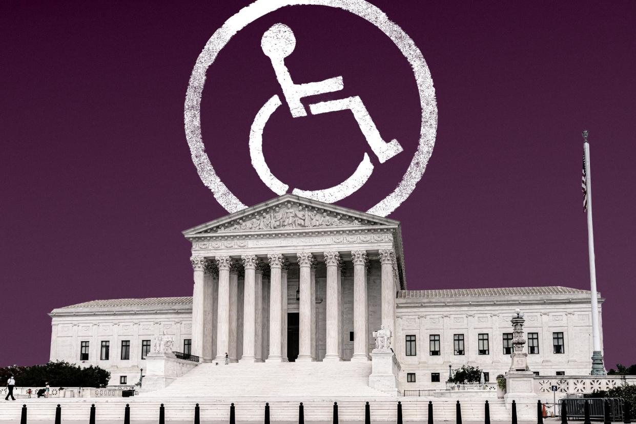 A disabled parking sign in front of the Supreme Court.