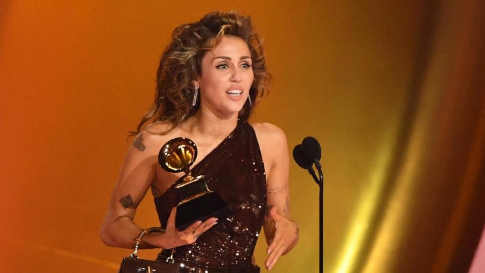 PHOTO: Miley Cyrus accepts the Record of the Year award for 'Flowers' during the 66th Annual Grammy Awards in Los Angeles, Feb. 4, 2024. (Valerie Macon/AFP via Getty Images)