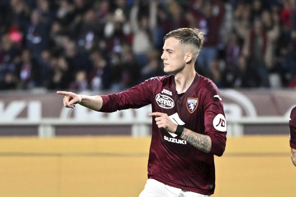 Torino's Ivan Ilic celebrates after scoring the 2-0 goal for his team, during the Serie A soccer match between Torino and AC Milan, Saturday, May 18, 2024, at the Olimpico Grande Torino Stadium in Turin, Italy. (Tano Pecoraro/LaPresse via AP)
