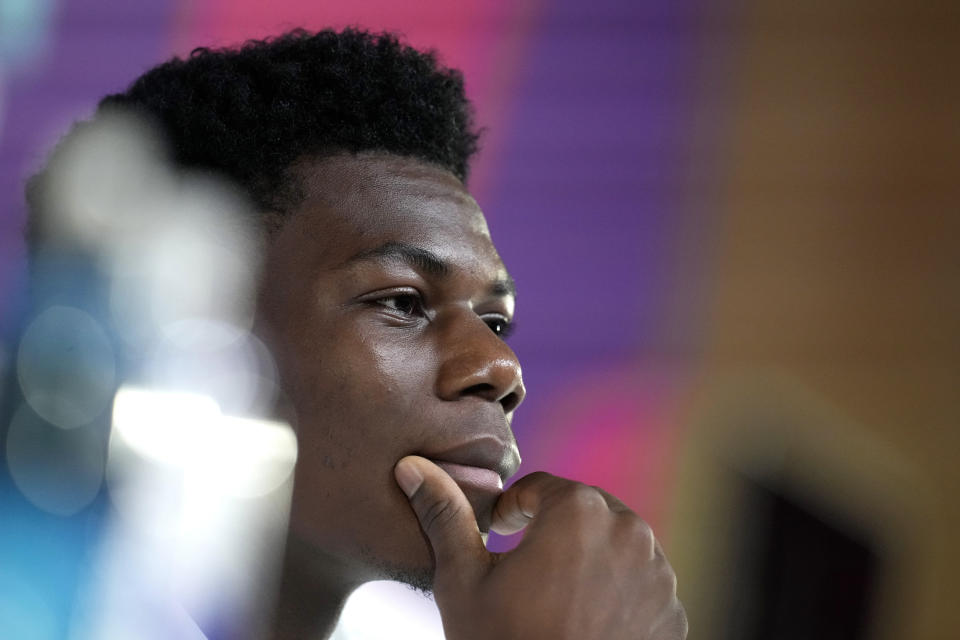 France's Aurelien Tchouameni listens to a reporter during a press conference in Doha, Qatar, Tuesday, Nov. 29, 2022, on the eve of the group D World Cup soccer match between Tunisia and France. (AP Photo/Christophe Ena)