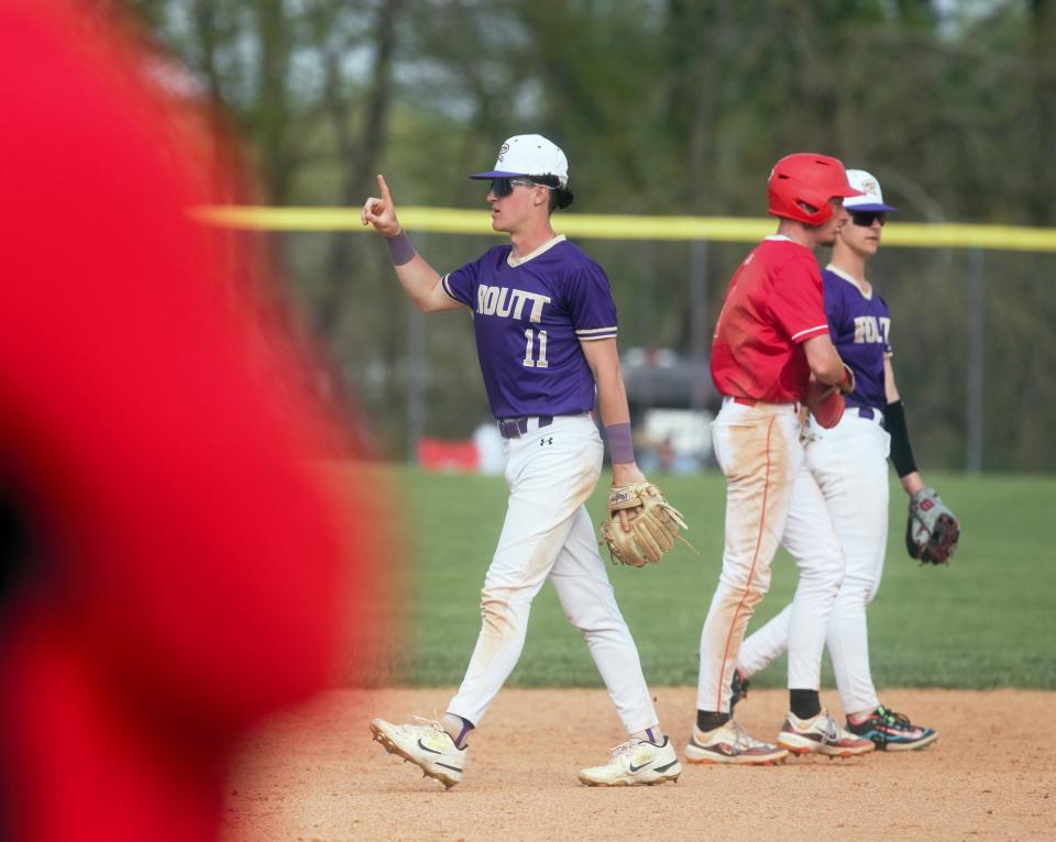 Jacksonville Routt's Nolan Turner signals one out following a tag at second base against Jacksonville in a nonconference baseball game at Alumni Field on Saturday, April 27, 2024. Jacksonville won 13-8.