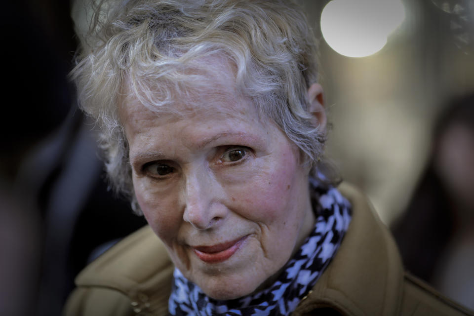 FILE - In this Wednesday, March 4, 2020 file photo, E. Jean Carroll talks to reporters outside a courthouse in New York. Justice Department lawyers asked a federal appeals court Friday, Jan. 15, 2021 to replace President Donald Trump with the United States as the defendant in a defamation lawsuit brought by Carroll who says he raped her in the 1990s. (AP Photo/Seth Wenig, File)