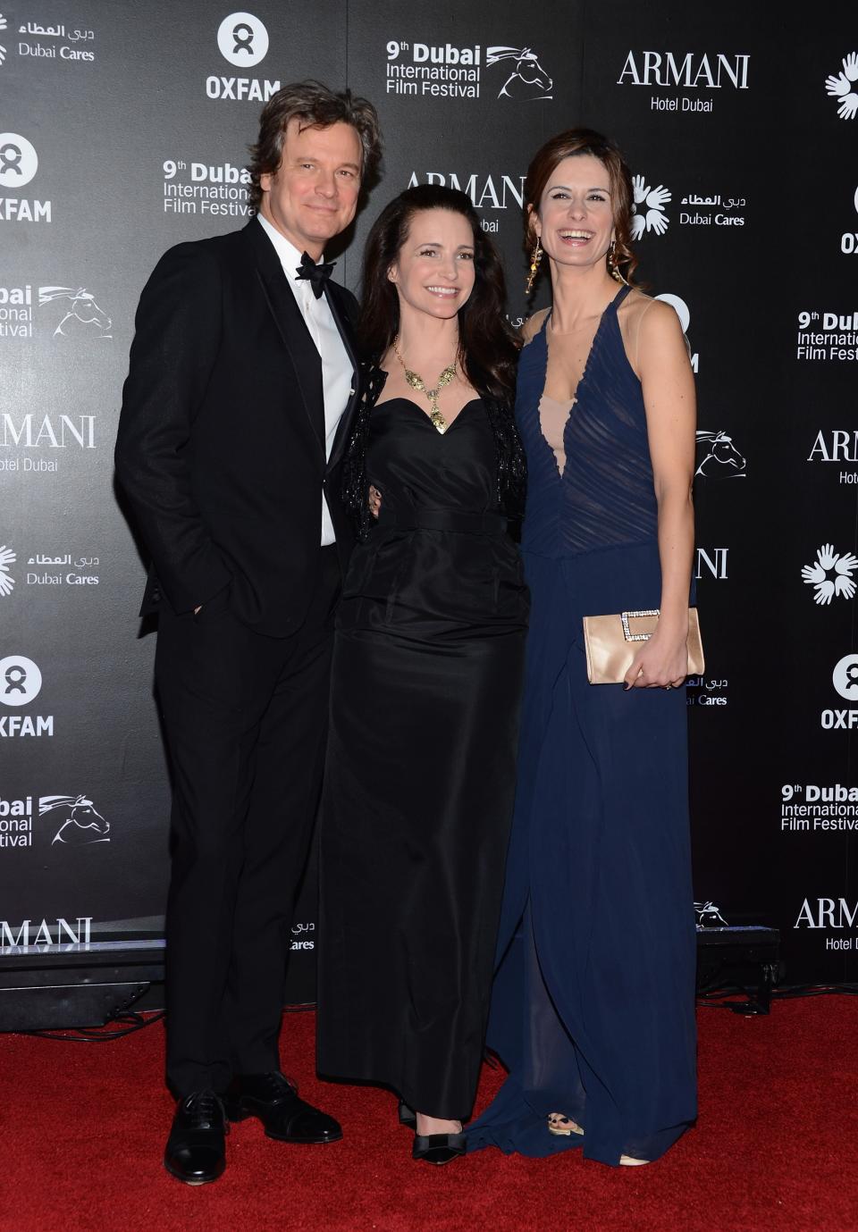 DUBAI, UNITED ARAB EMIRATES - DECEMBER 14: Actor Colin Firth, actress Kirstin Davis and Livia Firth attend the 2012 Dubai International Film Festival, Dubai Cares and Oxfam "One Night to Change Lives" Charity Gala at the Armani Hotel on December 14, 2012 in Dubai, United Arab Emirates. (Photo by Andrew H. Walker/Getty Images for DIFF)