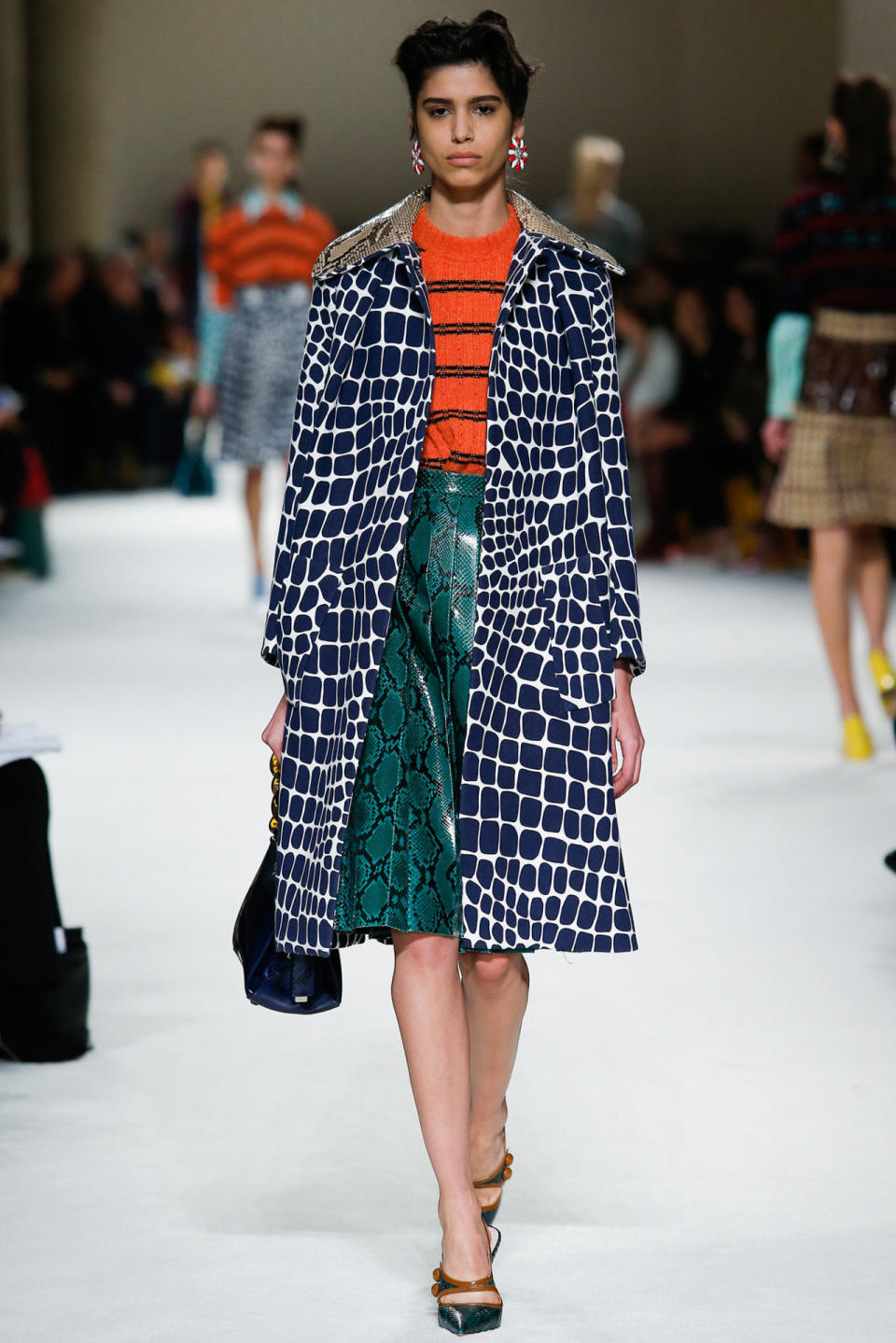 <p>The sister brand to Prada showcased a selection of jeweled tone mary janes in various fabrics and skins. Photo: IMAXtree</p>