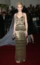 <p>At the “Paul Poiret” exhibit in 2007, Cate Blanchett wore a gold fringe Balenciaga column dress that was the definition of golden goddess. (Photo: Getty Images) </p>