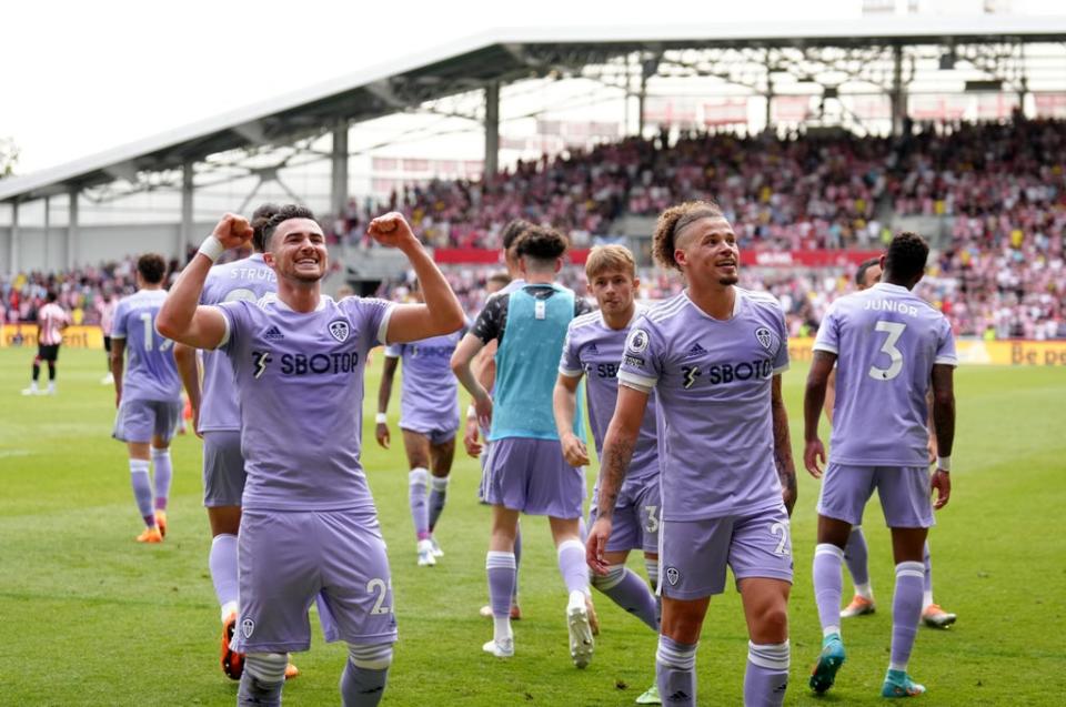 Jack Harrison (left) and Kalvin Phillips celebrate Leeds’ late winner at Brentford (PA)