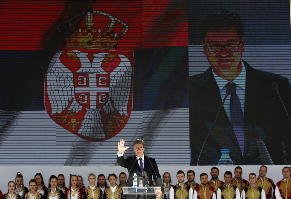 Serbian President Aleksandar Vucic waves to his supporters during a rally in the northern, Serb-dominated part of Mitrovica, Kosovo, Sunday, Sept. 9, 2018. NATO-led peacekeepers in Kosovo say the safety of Serbia President Aleksandar Vucic during a visit to Kosovo isn't threatened despite roadblocks that prevented his visit to a central Serb-populated village. (AP Photo/Darko Vojinovic)