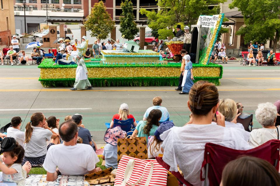 Parade participants walk by with their float at the Days of ’47 Parade in Salt Lake City on Monday, July 24, 2023. | Megan Nielsen, Deseret News