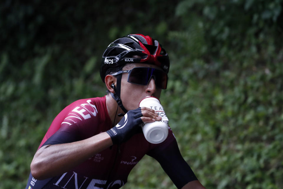 Colombia's Egan Arley Bernal Gomez resupplies during the sixth stage of the Tour de France cycling race over 160 kilometers (100 miles) with start in Mulhouse and finish in La Planche des Belles Filles, France, Thursday, July 11, 2019. (AP Photo/Christophe Ena)