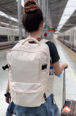 A fully waterproof tricked-out travel backpack complete with two laptop sleeves, a shoe compartment, a secret anti-theft pocket, a USB charging port, and a wet bag for sweaty clothes or liquids