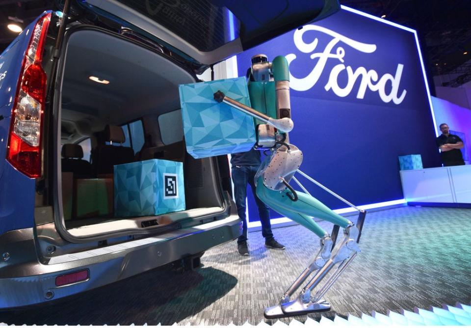 Digit, an upright robot by Agility Robotics demonstrates package delivery at the Ford booth during CES 2020 at the Las Vegas Convention Center on January 7, 2020.