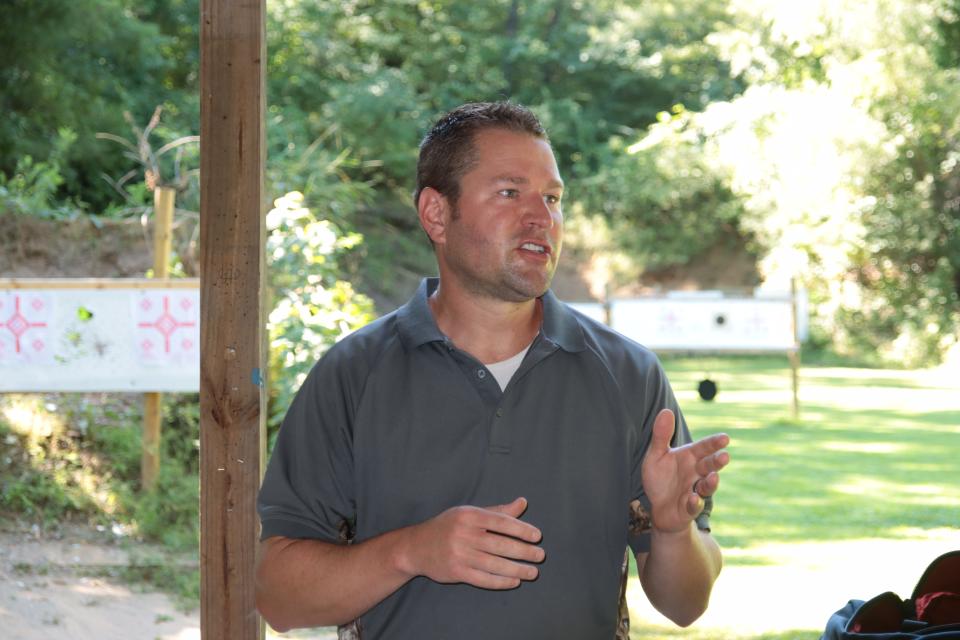 Lenawee County Commissioner Dustin Krasny, R-Cambridge Twp., addresses people gathered at a youth shooting event Saturday, Aug. 6, 2022, at the Lenawee County Conservation League.