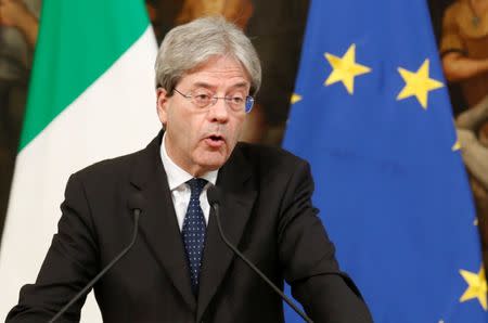 Italian Prime Minister Paolo Gentiloni talks to the media at Chigi Palace in Rome, Italy April 7, 2017. REUTERS/Remo Casilli