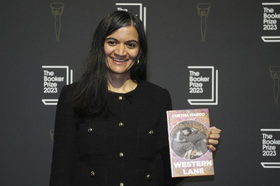 British author Chetna Maroo poses with her book "Western Lane" during a photocall with the six shortlisted authors for the Booker Prize 2023, in London, Thursday, Nov. 23, 2023 ahead of the award ceremony on Nov. 26 in London. (AP Photo/Kin Cheung)