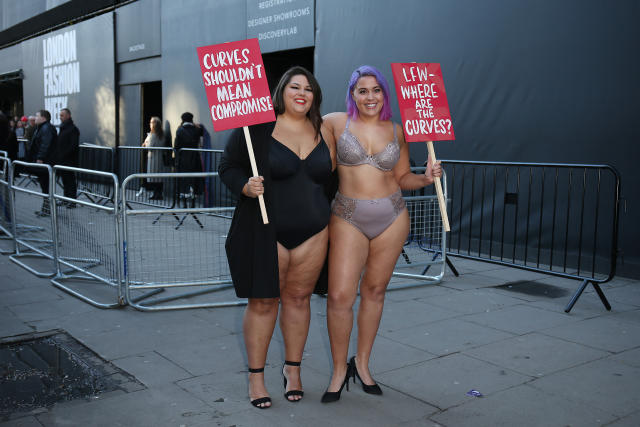 Plus-size women turn up to London Fashion Week in lingerie to protest the  lack of curves