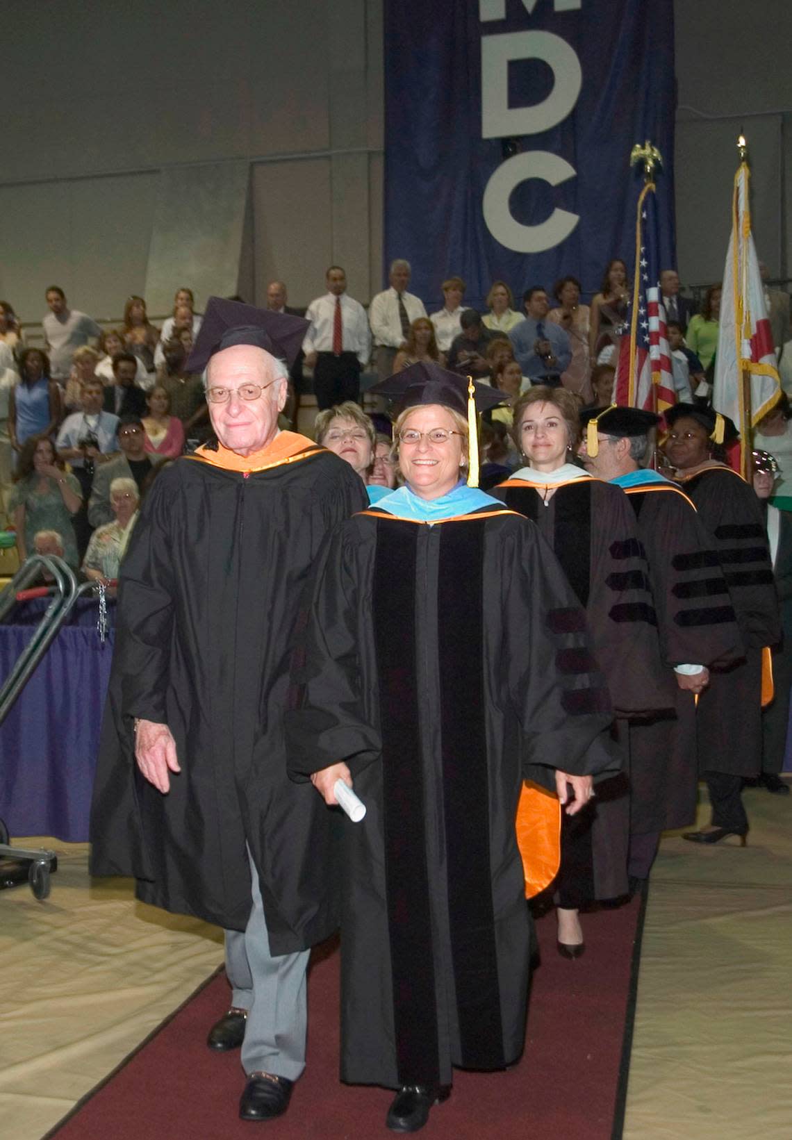 Stanley Tate and Rep. Ileana Ros-Lehtinen, who both worked on the Florida Prepaid College Plan Tate conceived and funded, at a 2005 graduation ceremony on the Kendall campus of Miami Dade College on April 30, 2015.