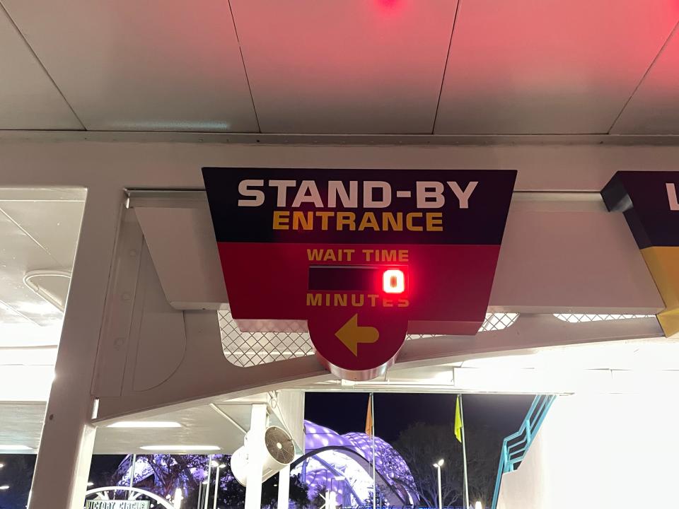 stand-by entrance line sign at disney world magic kingdom