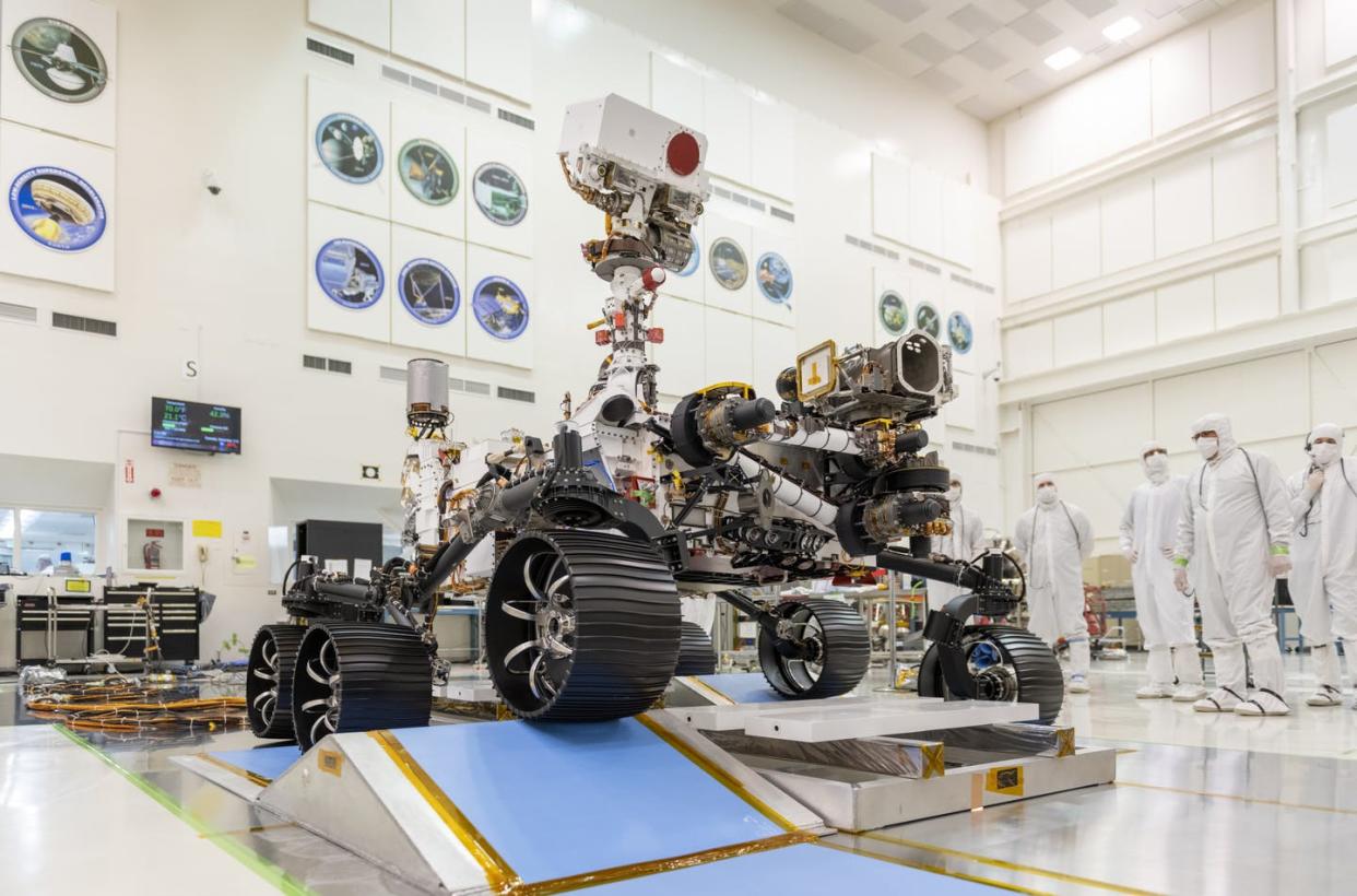 <span class="caption">In a clean room at NASA's Jet Propulsion Laboratory in Pasadena, Calif., engineers observed the first driving test for the Mars rover, Perseverance. Perseverance will search for signs of past microbial life, characterize Mars' climate and geology, and collect samples for a future return to Earth. </span> <span class="attribution"><a class="link " href="https://mars.nasa.gov/resources/24732/mars-2020-rover-is-roving/" rel="nofollow noopener" target="_blank" data-ylk="slk:NASA/JPL-Caltech;elm:context_link;itc:0;sec:content-canvas">NASA/JPL-Caltech</a></span>