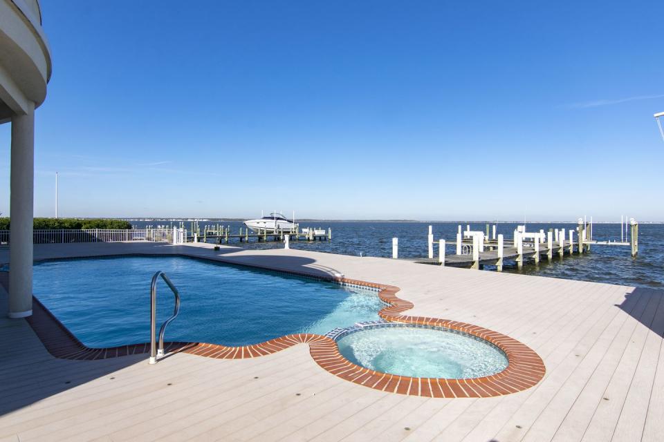 11) The Spacious Pool Terrace Sits At The Water's Edge