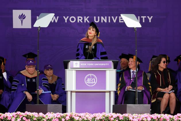 Swift — pictured here delivering a 2022 commencement address at New York University — writes lyrics that are great teaching tools for lessons on figurative language, educators say.