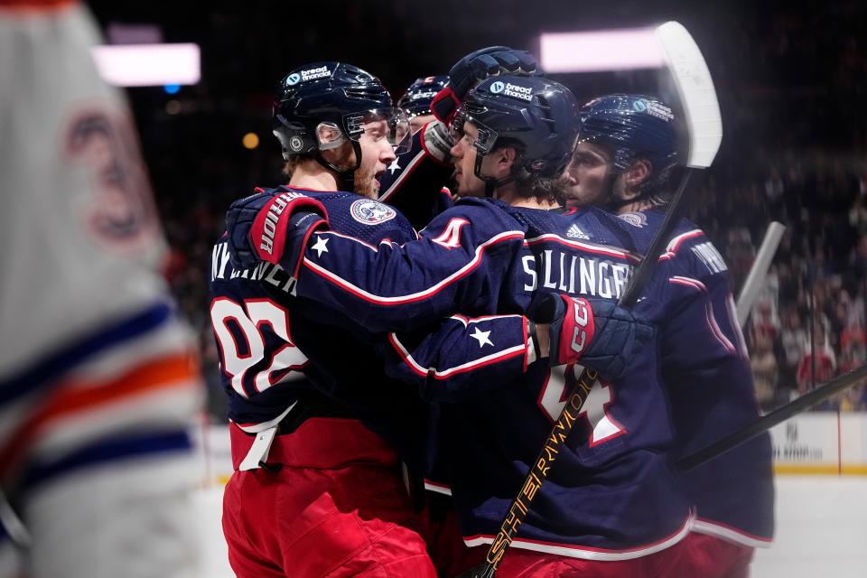 Mar 7, 2024; Columbus, Ohio, USA; Teammates celebrate a goal by Columbus Blue Jackets left wing Alex Nylander (92) during the first period of the NHL hockey game against the Edmonton Oilers at Nationwide Arena.
(Credit: Adam Cairns/Columbus Dispatch)
