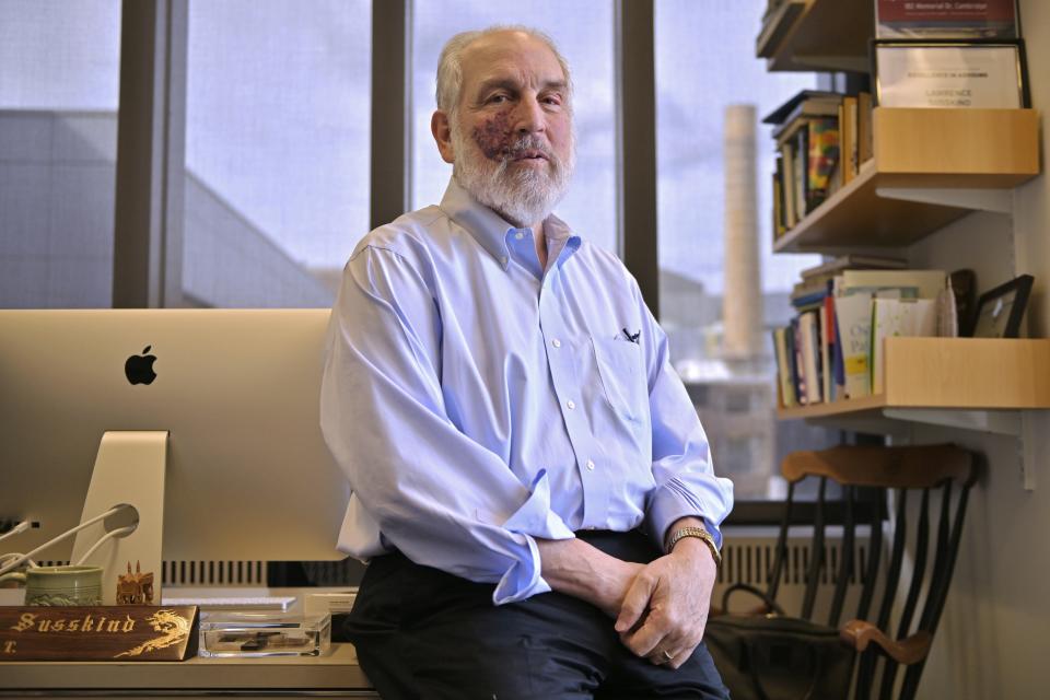 Larry Susskind, professor of Urban and Environmental Planning, poses for a photo in his office in the Department of Urban Studies and Planning at the Massachusetts Institute of Technology, Friday, Sept. 15, 2023, in Cambridge, Mass. MIT is offering a first-of-its-kind course that trains students to be mediators in conflicts over clean energy projects. (AP Photo/Josh Reynolds)