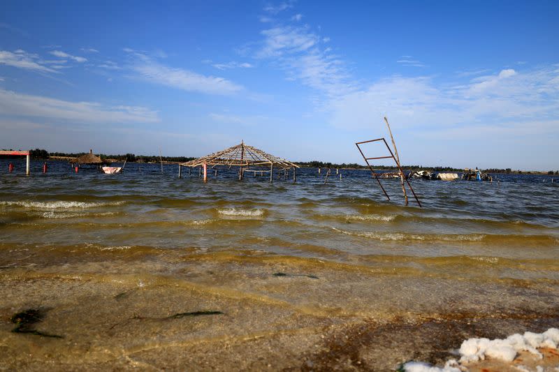 A general view of the submerged tourism businesses at the Pink Lake